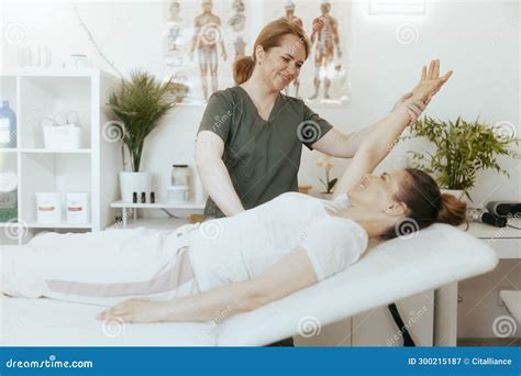 Female Therapist In Massage Cabinet Conducting Examination Stock Image Image Of Female