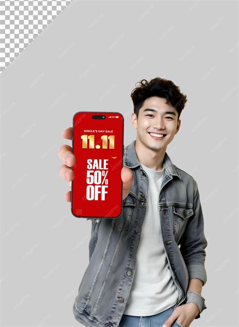 Young man holding smartphone mockup with 11 11 sale | Premium AI
