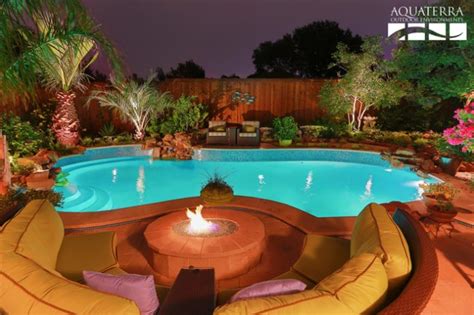 20 Sophisticated Outdoor Fire Pit Designs Near The Swimming Pool