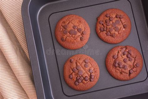 Delicious Homemade Chocolate Chip Cookies On A Baking Tray Stock Photo