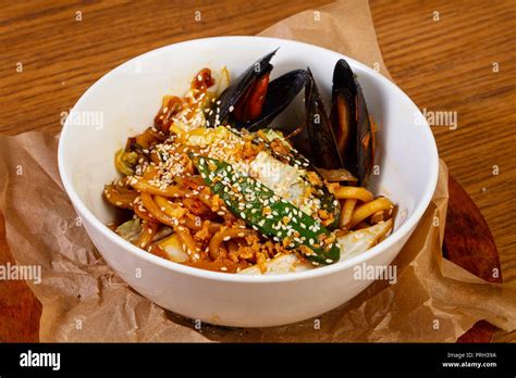 Pasta With Seafood And Sesam Seeds Stock Photo Alamy