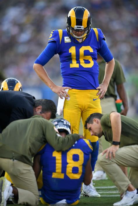 Jared Goff Looks At An Injured Cooper Kupp Of The Los Angeles Rams