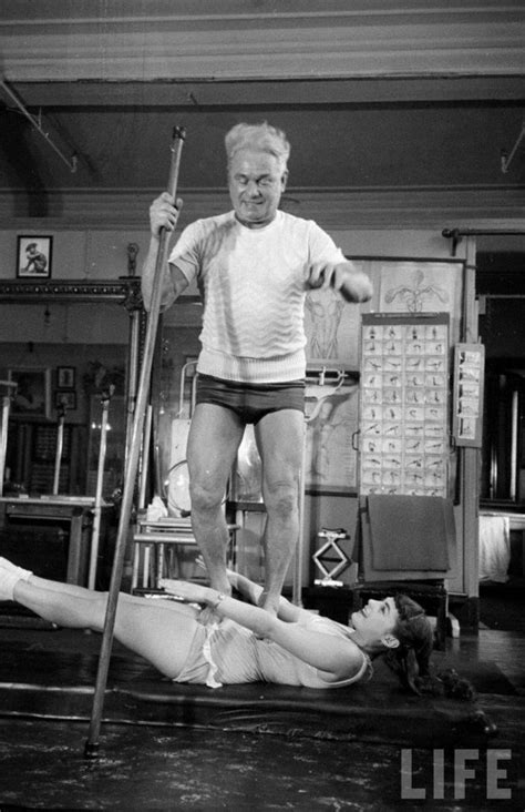 Vintage Joseph Pilates Standing On His Client Doing The Vintage