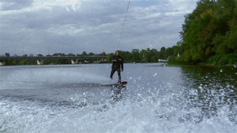 Free stock video - Man riding wakeboard