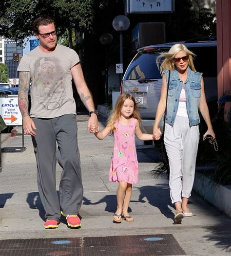 Putting It Back Together Tori Spelling And Dean McDermott Hold Hands