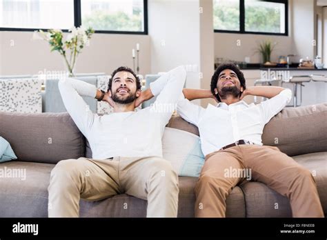 Gay Couple Relaxing Sofa Hi Res Stock Photography And Images Alamy