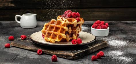 Belgian Waffles With Raspberries Strawberries And Blueberries Sugar