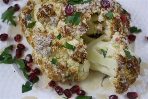 Whole Roasted Cauliflower With Fresh Pomegranate And Tahini Sauce