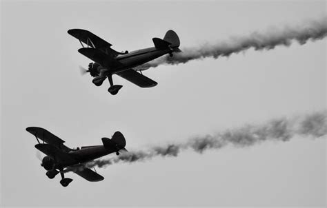 Premium Photo Low Angle View Of Airplanes Flying Against Clear Sky