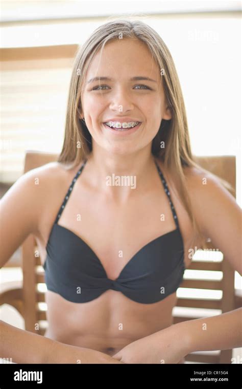 Teenage Girl With Braces Wearing Bikini Photo Stock Alamy