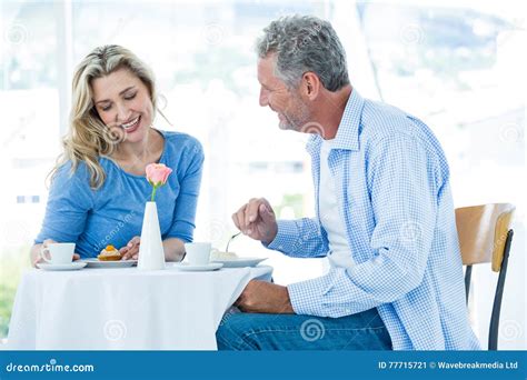 Smiling Mature Man Looking At Woman While Sitting Stock Image Image Of Cheerful Happiness