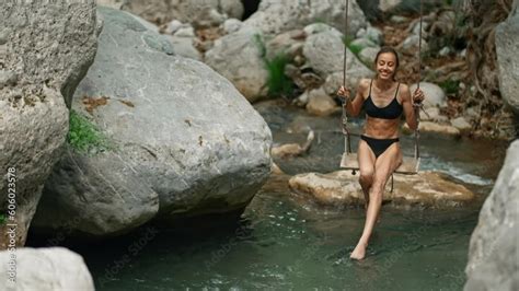 Summer Vacations Of Bikini Beach Girl Model In Black Swimsuit On Palm Tree Swing Over Mountain