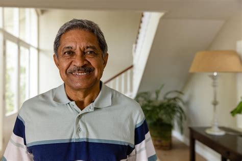 Premium Photo Portrait Of Happy Senior Biracial Man At Home With Copy