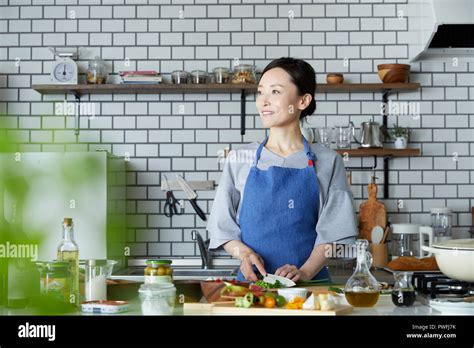 Japanese Mature Woman In The Kitchen Stock Photo Alamy