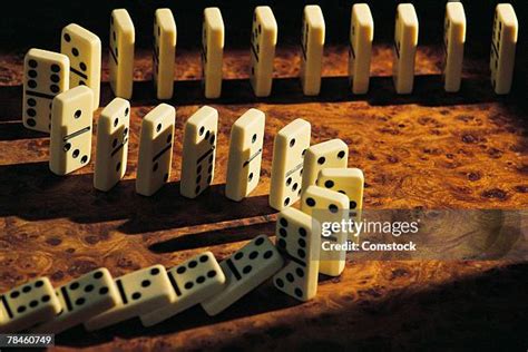 Dominoes Falling Photos And Premium High Res Pictures Getty Images