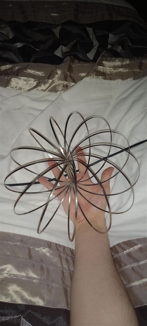 Weird metal thingy that "opens up" into a shape : r/whatisthisthing