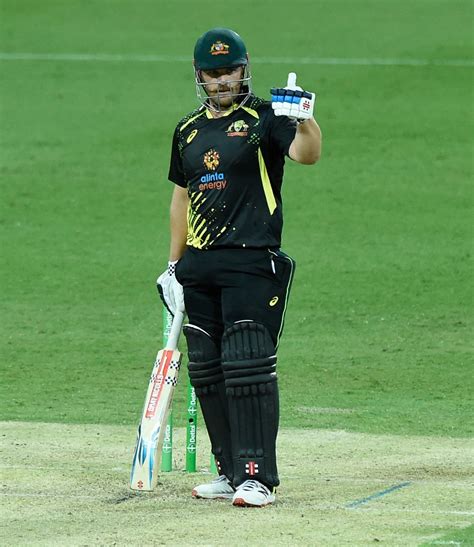 Aaron Finch Gives A Thumbs Up After Reaching A Half Century