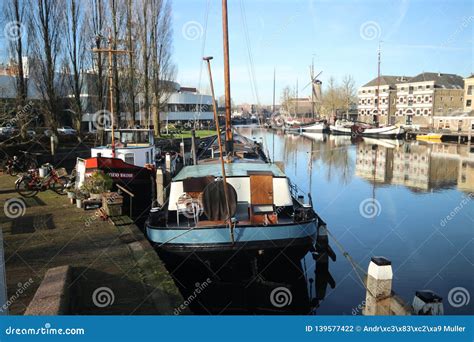 Old Museum Harbor Of Gouda With Historic Ships At Mallegatsluis Sluice