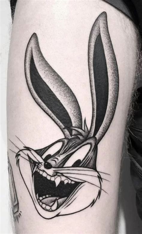 10 Bugs Bunny Tattoo Designs And Ideas Nsf Magazine Bunny Tattoos Picture Tattoos Bugs Bunny