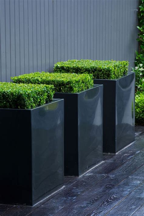 37 Modern Planters To Make Your Outdoors Stylish - DigsDigs