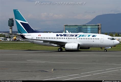 C GWSY WestJet Boeing 737 7CT WL Photo By Daniel Schwinn ID 1601077