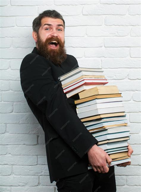 Premium Photo Funny Teacher Or Professor With Book Stack Thinking Serious Mature Teacher