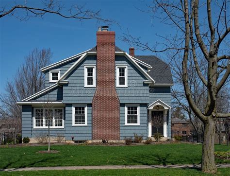 Brick House With Blue Siding Stock Photo - Image of family, home: 13321010