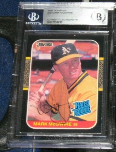 MARK MCGWIRE OAKLAND ATHLETICS A S SIGNED 1987 DONRUSS ROOKIE CARD BAS