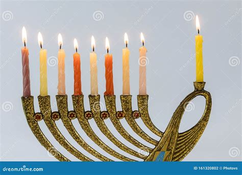 Menorah With Lit Candles In Celebration Of Chanukah A Symbolic Candle