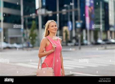 smiling young woman  city street  res stock photography  images