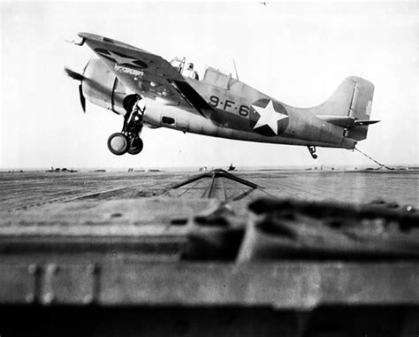 Asisbiz Grumman F4F 4 Wildcat VF 9 Black 9F6 Landing Aboard CV 4 USS