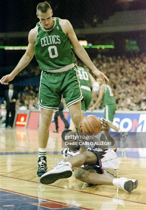 toronto raptor carlos rogers falls   ball  boston celtic