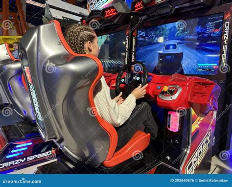 Woman Driving a Racing Game. Girl on a Racing Car Simulator. Concept ...