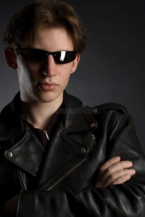 A Young Man In Leather Jacket And Sunglasses Stock Image Image Of