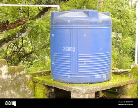 Water Storage Tank On The House Roof Stock Photo Alamy