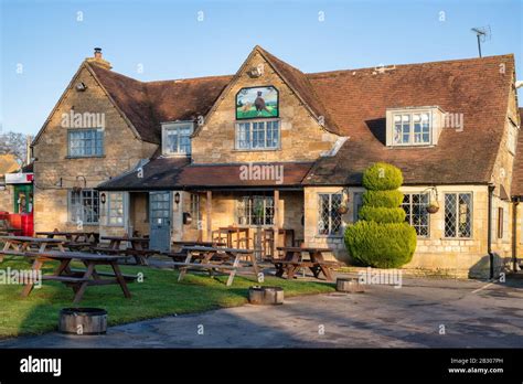 The Pheasant Inn in the afternoon winter sunlight, Toddington ...