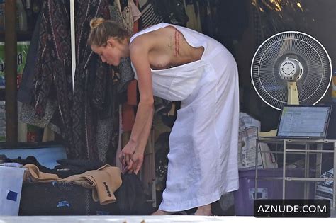 Amber Heard Nip Slip Exposes Boob While Cleaning Out Her Garage In LA AZNude