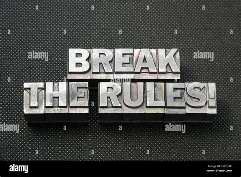 Break The Rules Phrase Made From Metallic Letterpress Blocks On Black