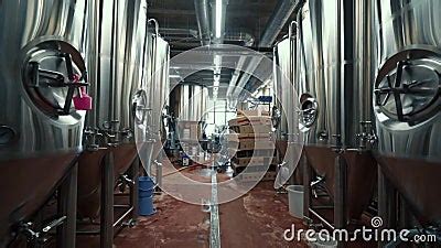 Large Steel Tanks With Beer In Industrial Brewery Plant Stainless