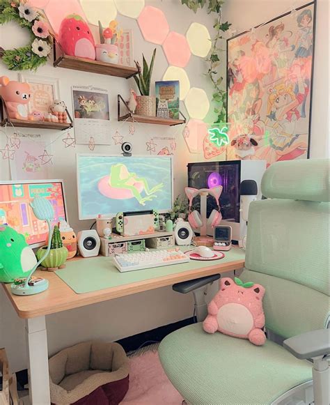 A Pink Chair Sits In Front Of A Desk With Many Pictures On It And A