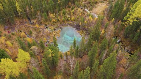 Geyser Blue Lake And Yellow Trees In Autumn Aerial View Altai