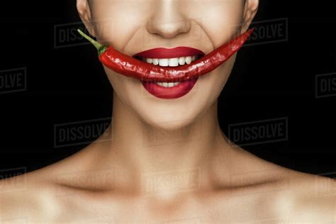 Cropped View Of Beautiful Naked Seductive Woman With Red Chili Pepper Isolated On Black Stock