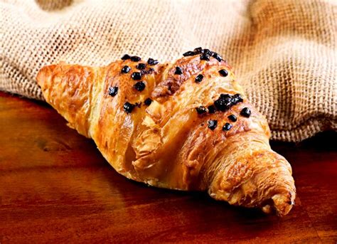 Premium Photo Close Up Of Croissant On Table