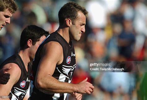 Anthony Rocca For Collingwood Runs Onto The Field Before The Start Of