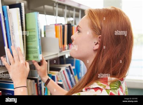 Female College Student Studying In Library Stock Photo Alamy