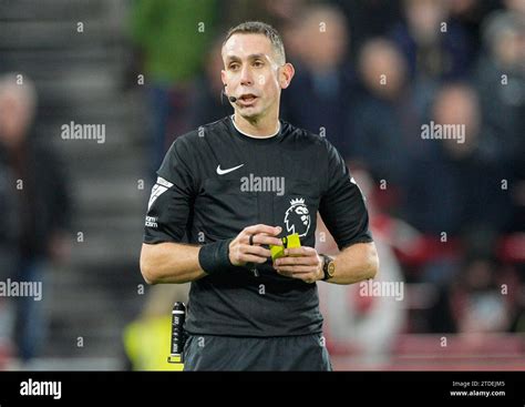 Referee David Coote With Yellow Card During The English Premier League