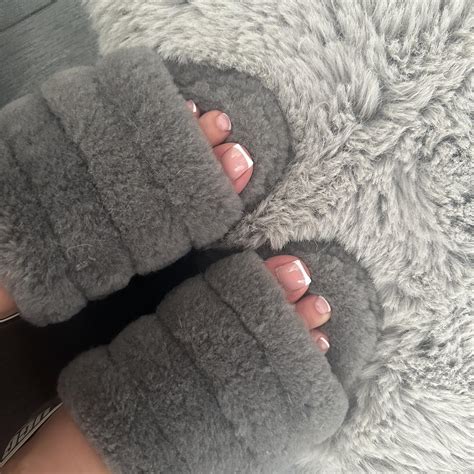 Grey Ugg slippers in great condition worn once or... - Depop