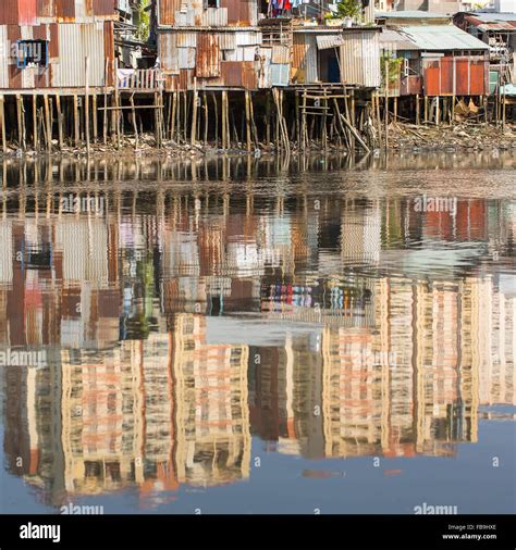 Views Of The Citys Slums From River In Water Reflection Of The New