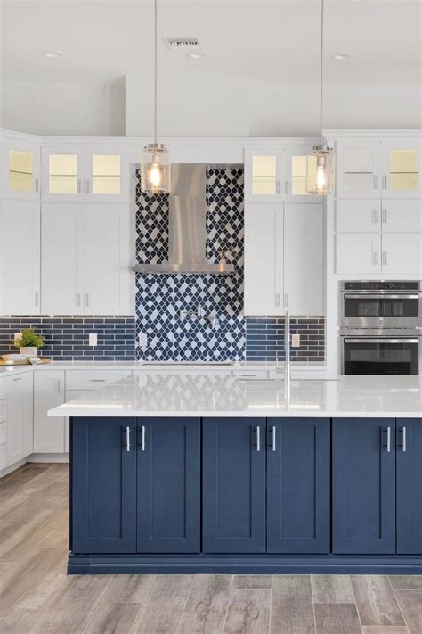 We Love Color White Kitchen Cabinets And A Blue Kitchen Island In This