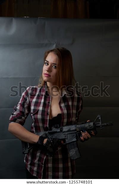 Sexy Blonde Black Bra Gun Stock Photo 1255748101 Shutterstock